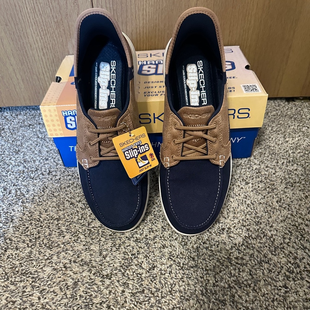 Skechers women’s Blue and Tan Boat Shoes